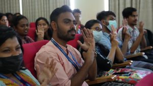 Moments from the sensitization session where students are learning Indian Sign Language