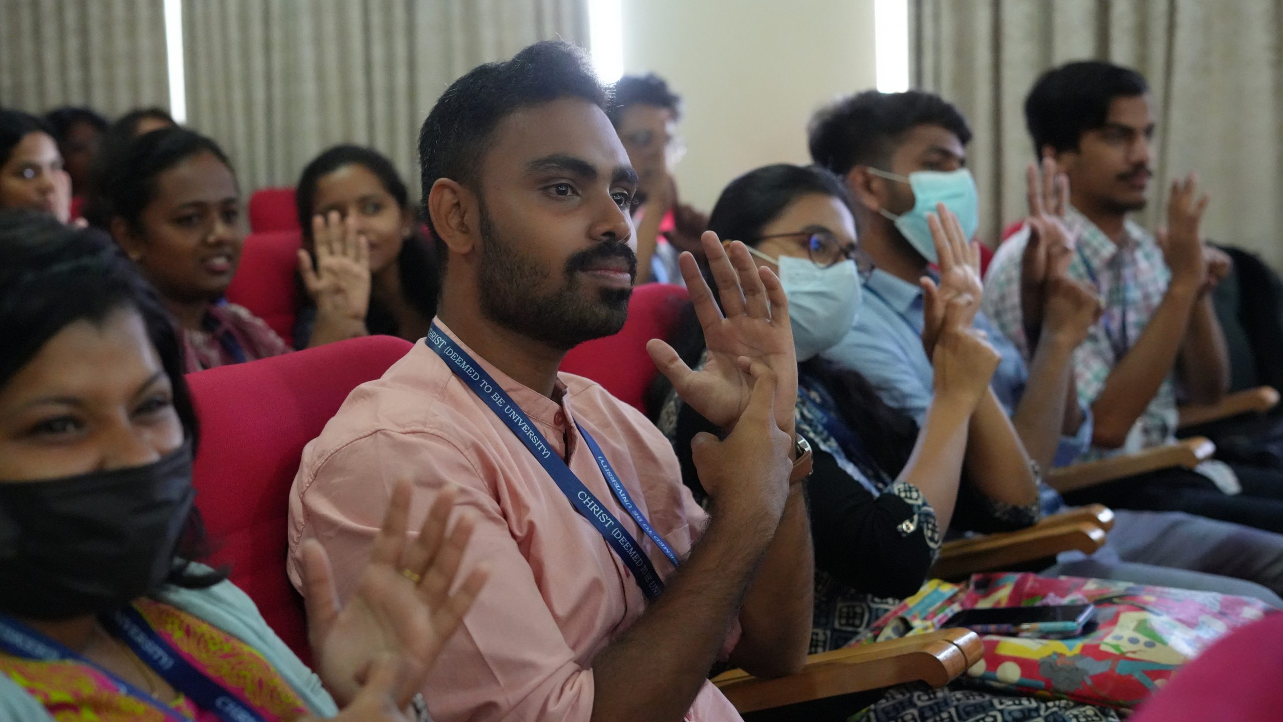 Moments from the sensitization session where students are learning Indian Sign Language