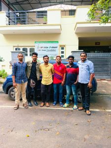 The photo of candidates posing in front of our office