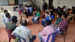 Menaga teaching deaf candidates.