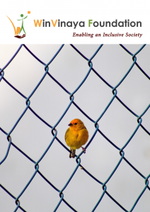 A bird sitting on a wired mesh about to fly.