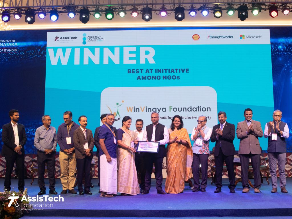 Akila and Shiva receiving the ATF Award for the "Best Assistive Technology Initiative among NGOs" at the Bengaluru Tech Summit.